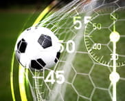 Orologi e cronometri e un pallone da calcio