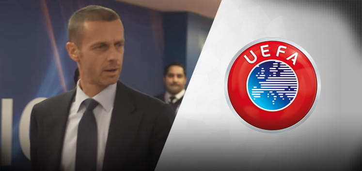 Il presidente dell’UEFA Aleksander Ceferin e il logo dell’UEFA